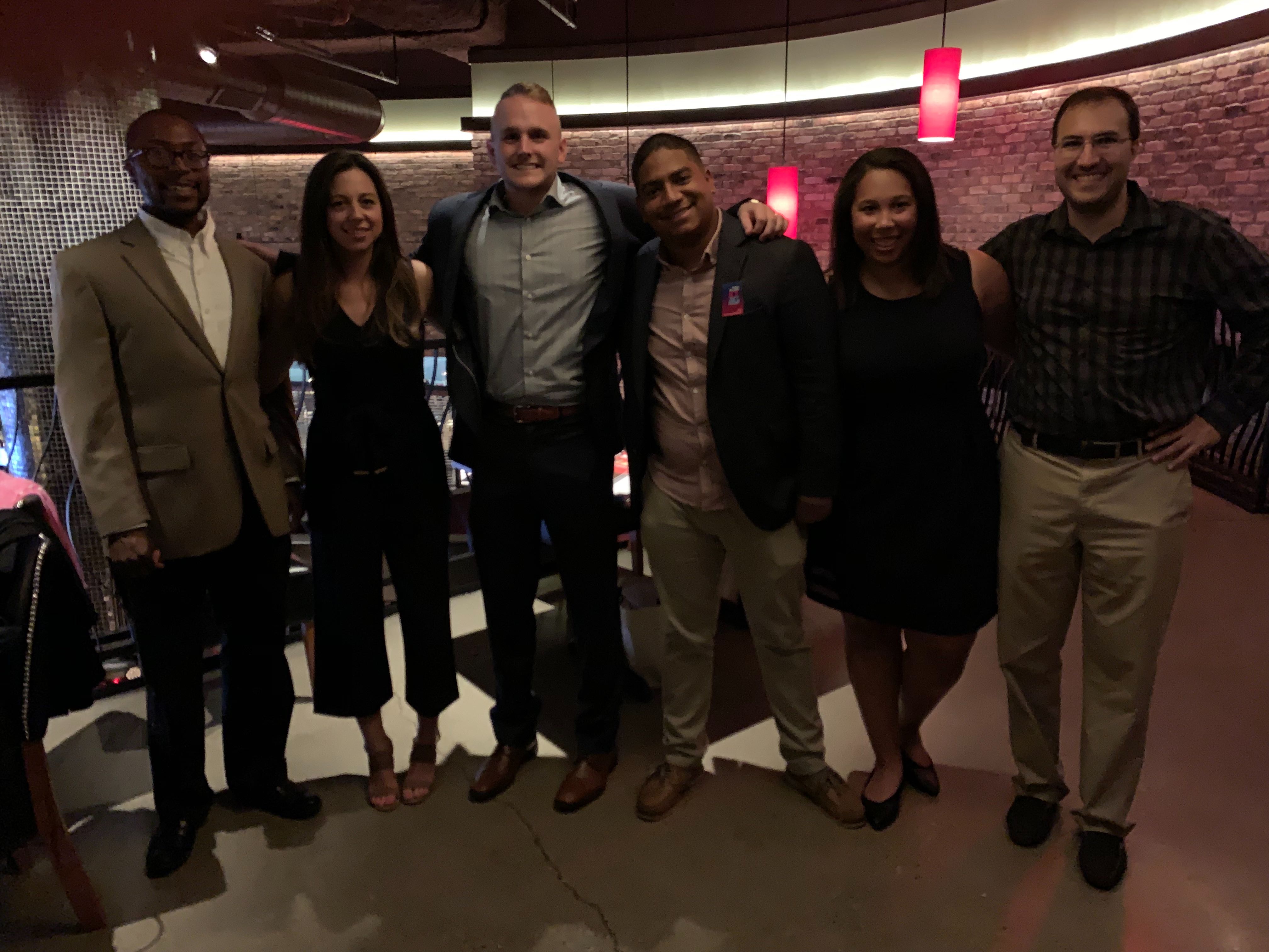 The Executive Committee of the Hamilton County Young Democrats stand together at Bar Louie in Carmel 2019